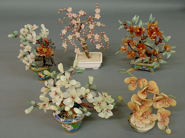 Appraisal: Five jade and stone flowering trees th c some with