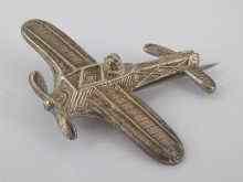 Appraisal: Aviation interest A silver airplane brooch designed as a single