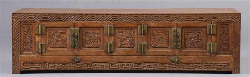 Appraisal: CHINESE BRASS-MOUNTED HARDWOOD KANG CABINET Enclosed by five hinged doors