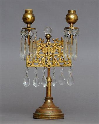 Appraisal: AESTHETIC MOVEMENT BRASS TWO-LIGHT GIRANDOLE The rectangular pieced standard with