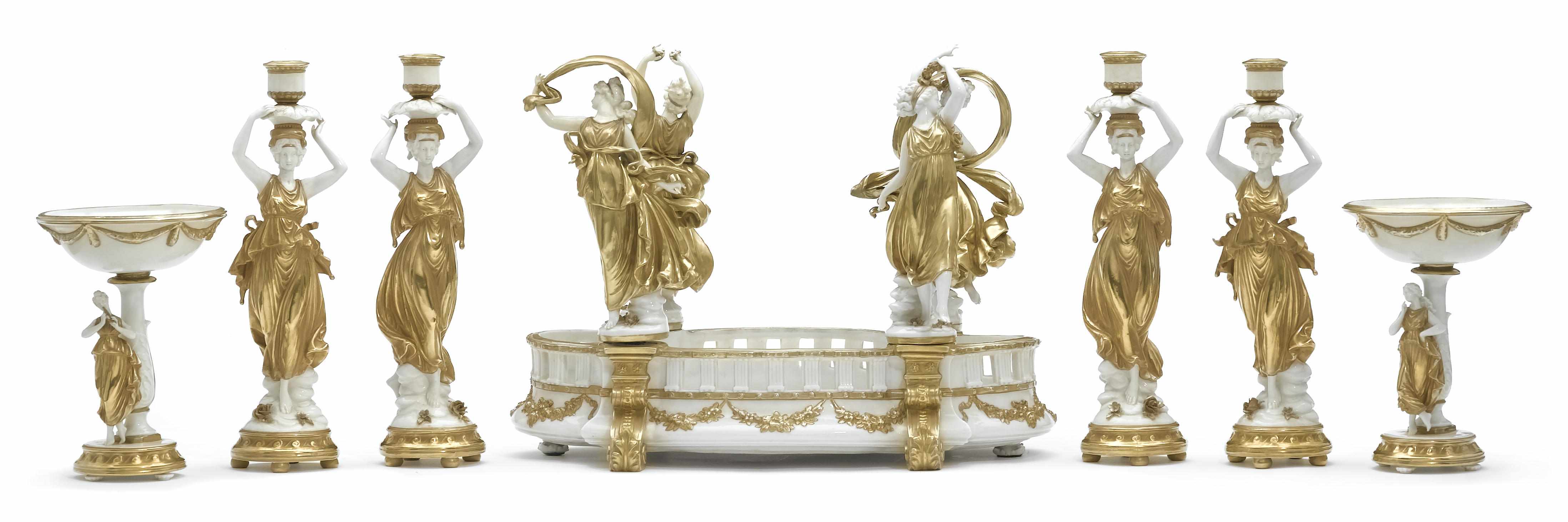 Appraisal: A German porcelain gilt decorated figural table garniture mid th