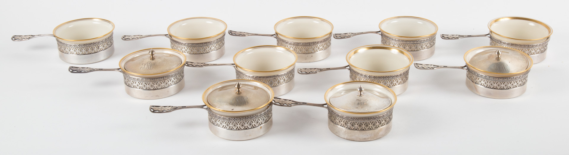 Appraisal: Eleven Watson sterling silver custard cup holders with Lenox liners