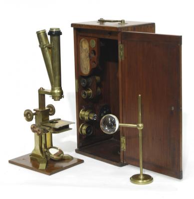 Appraisal: A VICTORIAN BRASS BINOCULAR MICROSCOPE by Newton Fleet Street London