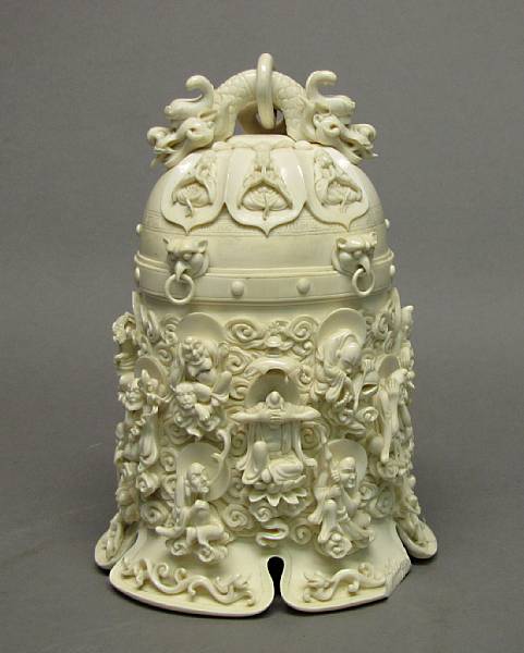 Appraisal: A carved ivory hanging bell th Century Carved in high