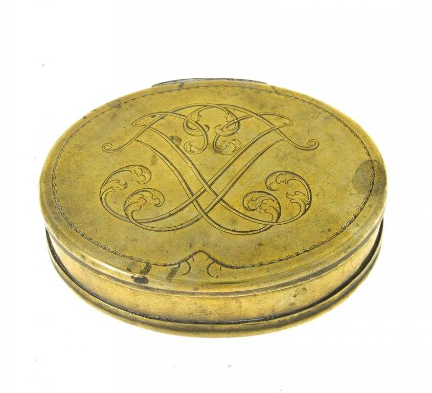 Appraisal: A NORTHERN EUROPEAN BRASS TOBACCO BOX oval the lid engraved