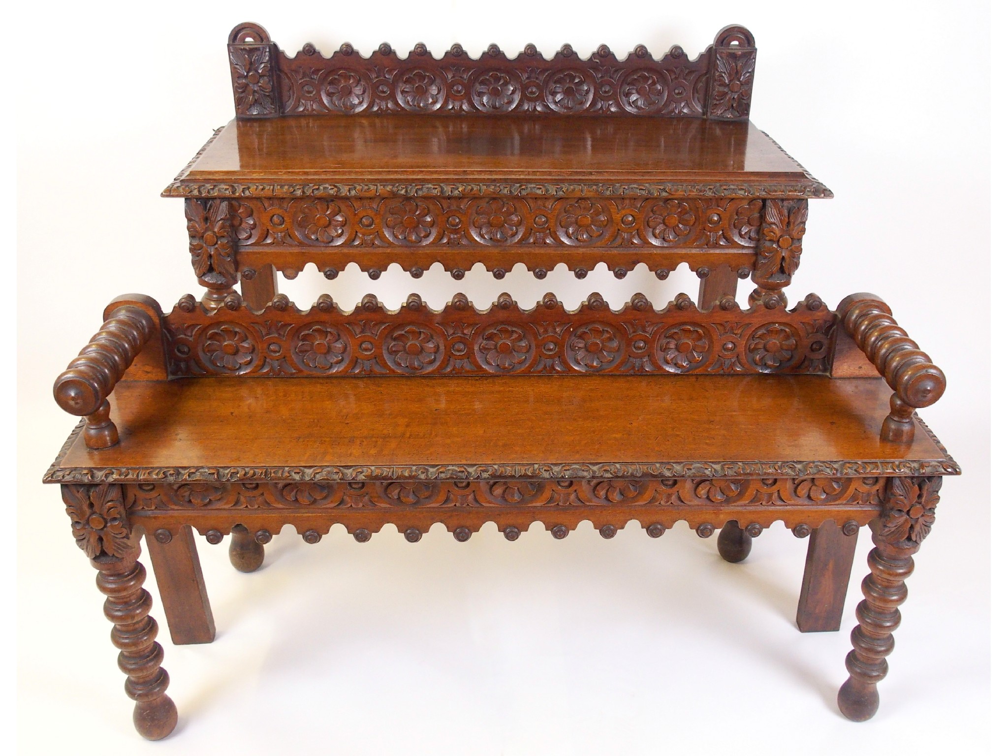 Appraisal: A Victorian oak hall table and hall seatcarved with foliate