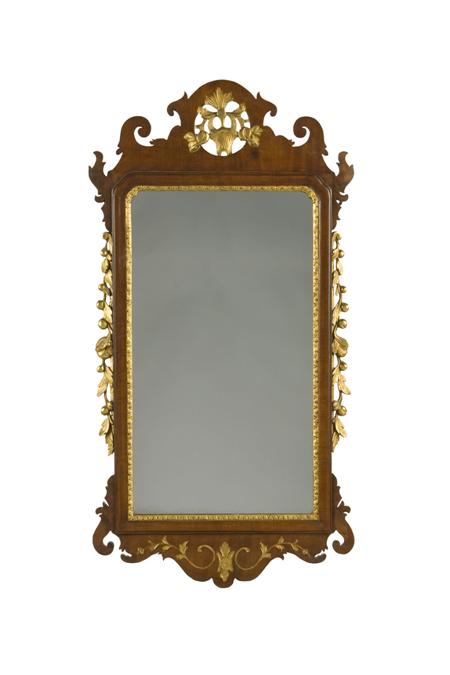 Appraisal: A Victorian mahogany and parcel gilt fretwork wall mirror in