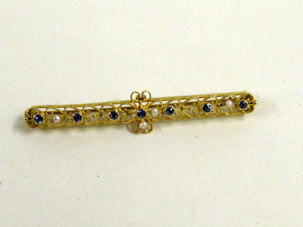 Appraisal: Fourteen carat gold seed pearl and sapphire set bar brooch