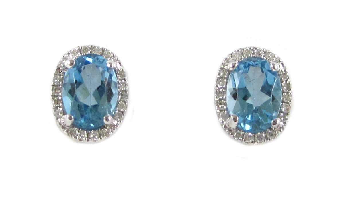 Appraisal: PAIR OF BLUE TOPAZ AND DIAMOND EARRINGS each k white