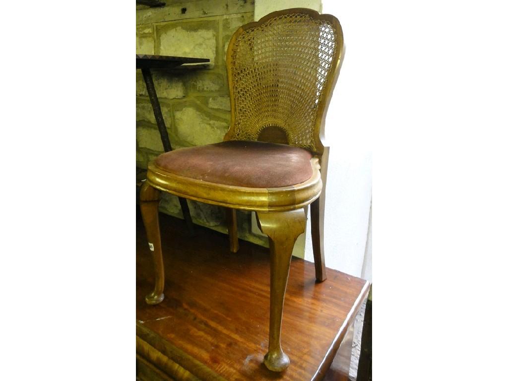 Appraisal: An Edwardian 's walnut occasional bedroom chair the raised cane