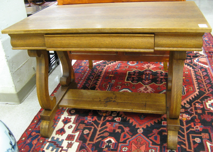 Appraisal: AN OAK EMPIRE REVIVAL LIBRARY TABLE American c having a