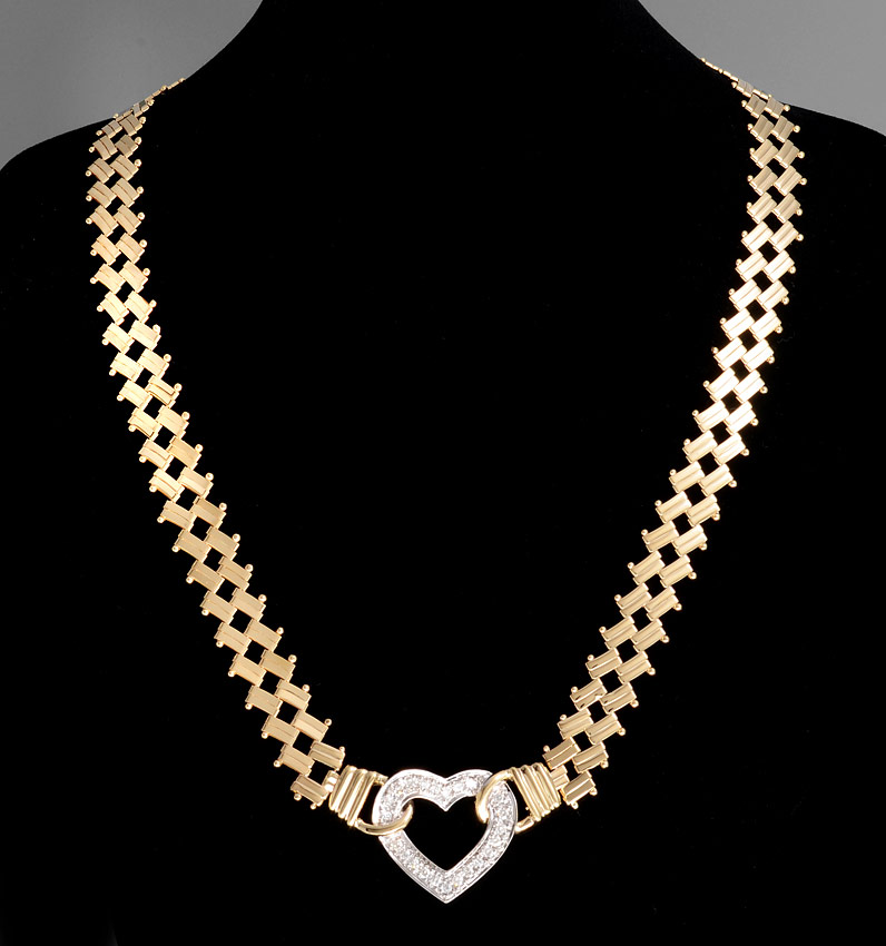 Appraisal: GOLD AND DIAMOND OPEN HEART NECKLACE K yellow gold neck