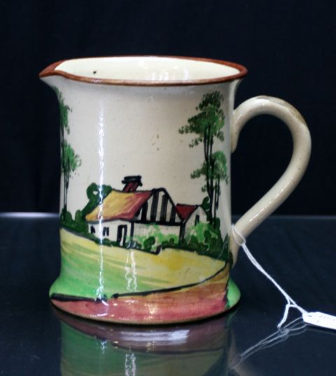 Appraisal: A Premier Pottery Preston jug decorated with a cottage scene