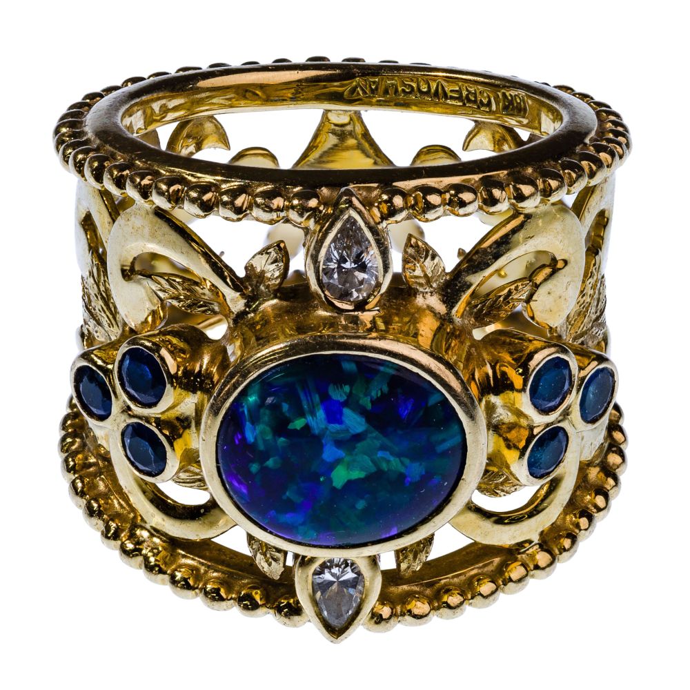 Appraisal: PAULA CREVOSHAY K YELLOW GOLD GEMSTONE AND DIAMOND RINGOpen work