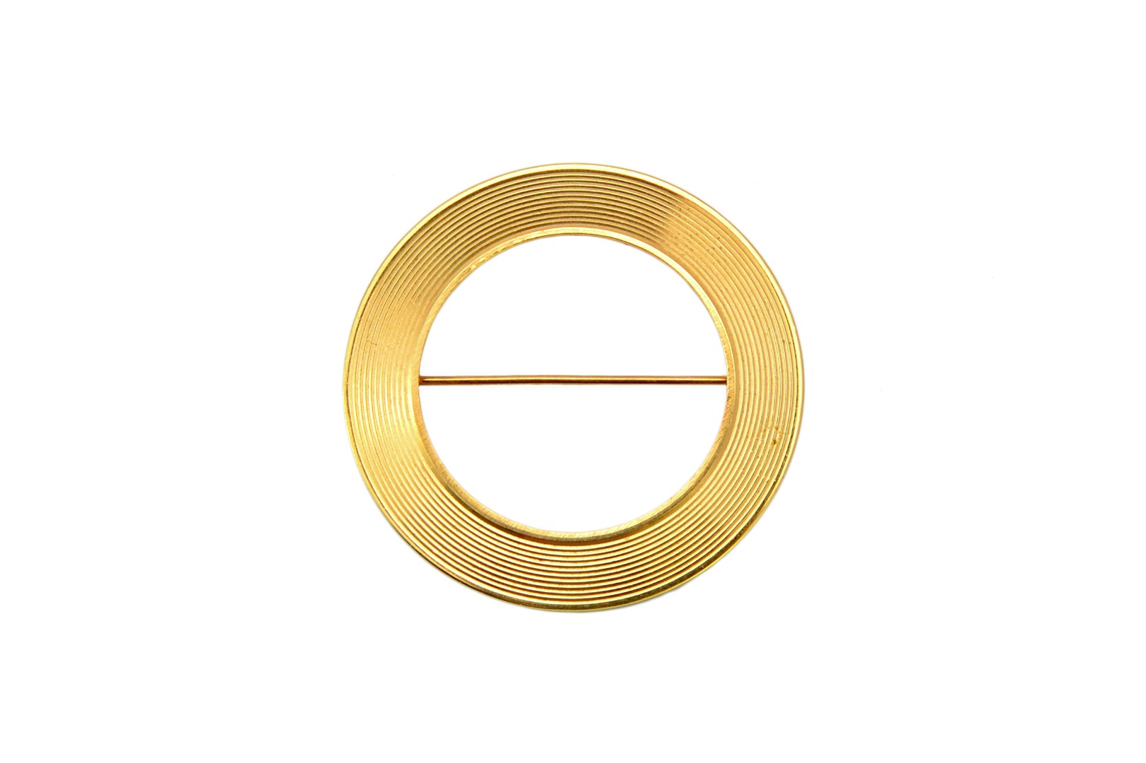 Appraisal: A Cartier gold brooch of circular form with concentric decoration