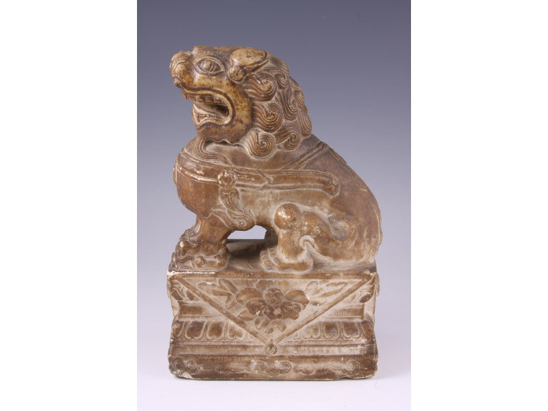 Appraisal: Chinese Antique Carved Stone Foo Dog seated on a plinth