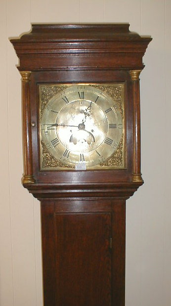 Appraisal: An thC oak longcase clock with caddy top and inset