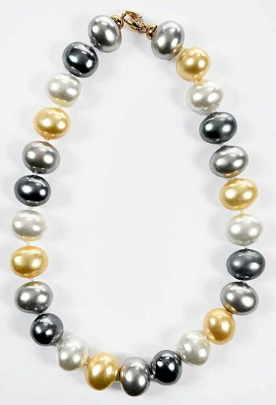 Appraisal: Faux Pearl Necklace knotted large oval egg shaped white yellow