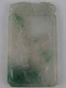 Appraisal: A Chinese jade rectangular plaque pendant carved on both sides