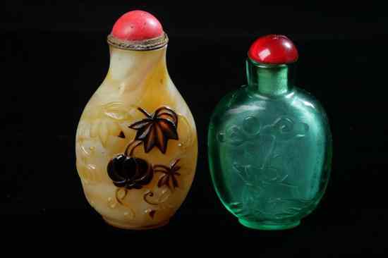 Appraisal: TWO CHINESE PEKING GLASS SNUFF BOTTLE One imitating agate carved