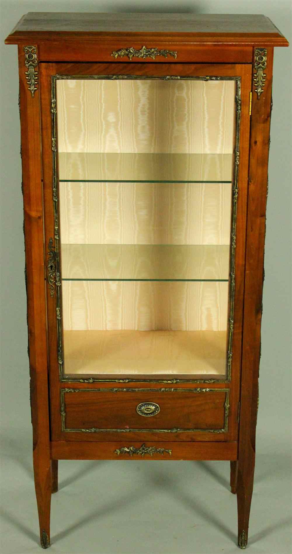 Appraisal: FRENCH EMPIRE WALNUT AND BRASS MOUNT DISPLAY CABINET having a