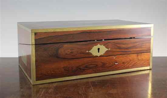 Appraisal: A Regency brass bound rosewood writing slope with fitted interior