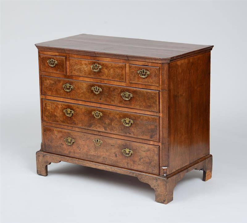 Appraisal: GEORGE II WALNUT CHEST OF DRAWERS The rectangular top with