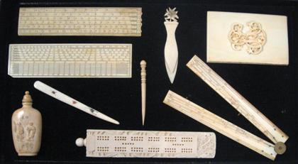 Appraisal: Group of carved ivory items th century Comprising three rulers