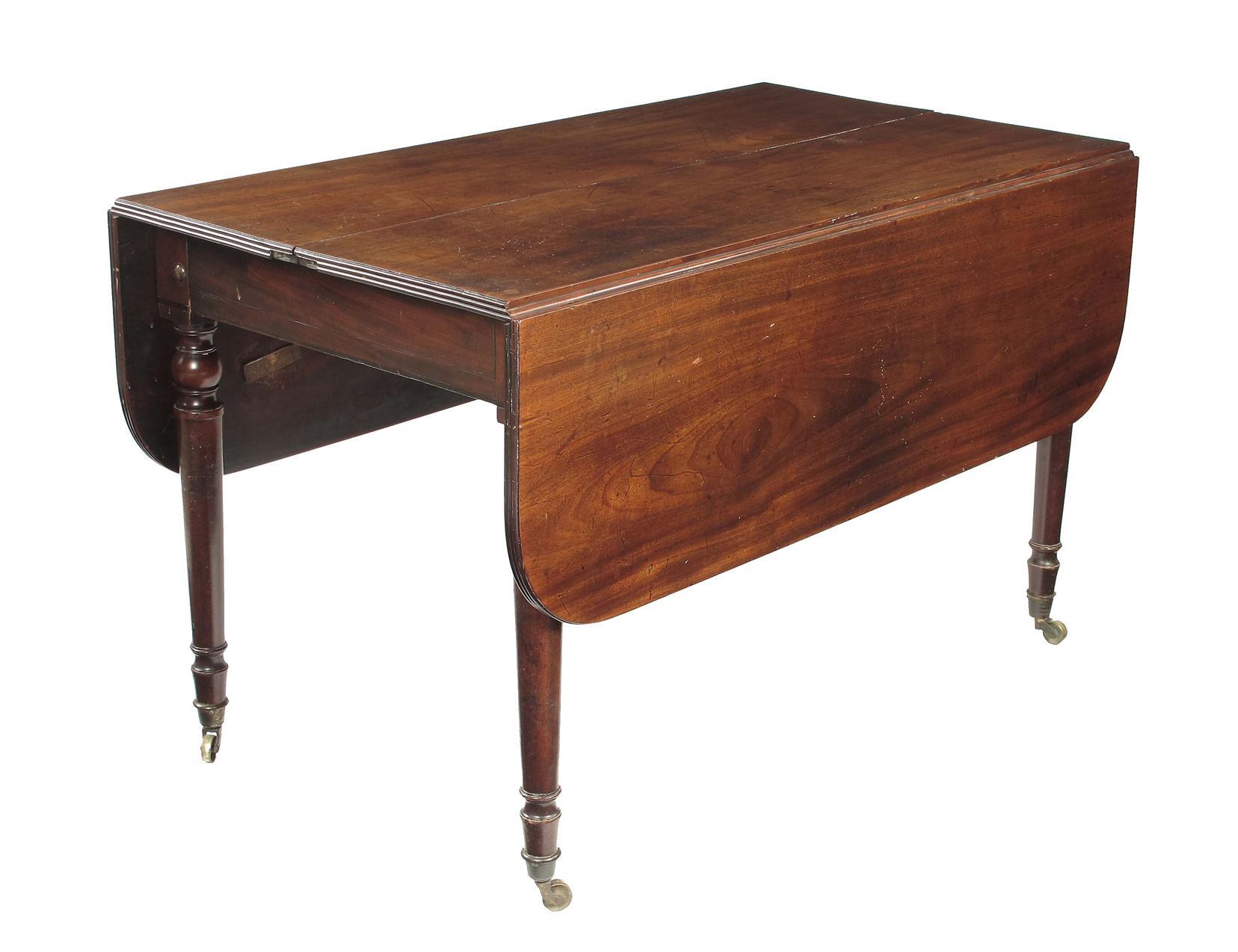 Appraisal: An early th century mahogany extending dining table