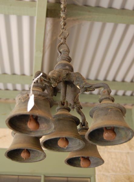 Appraisal: A SET OF BRASS HANGING BELLS