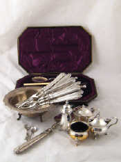 Appraisal: Silver plate A serving set of knife fork and two