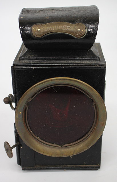 Appraisal: AN OLD BLACK PAINTED MILLER VEHICLE LAMP cm high