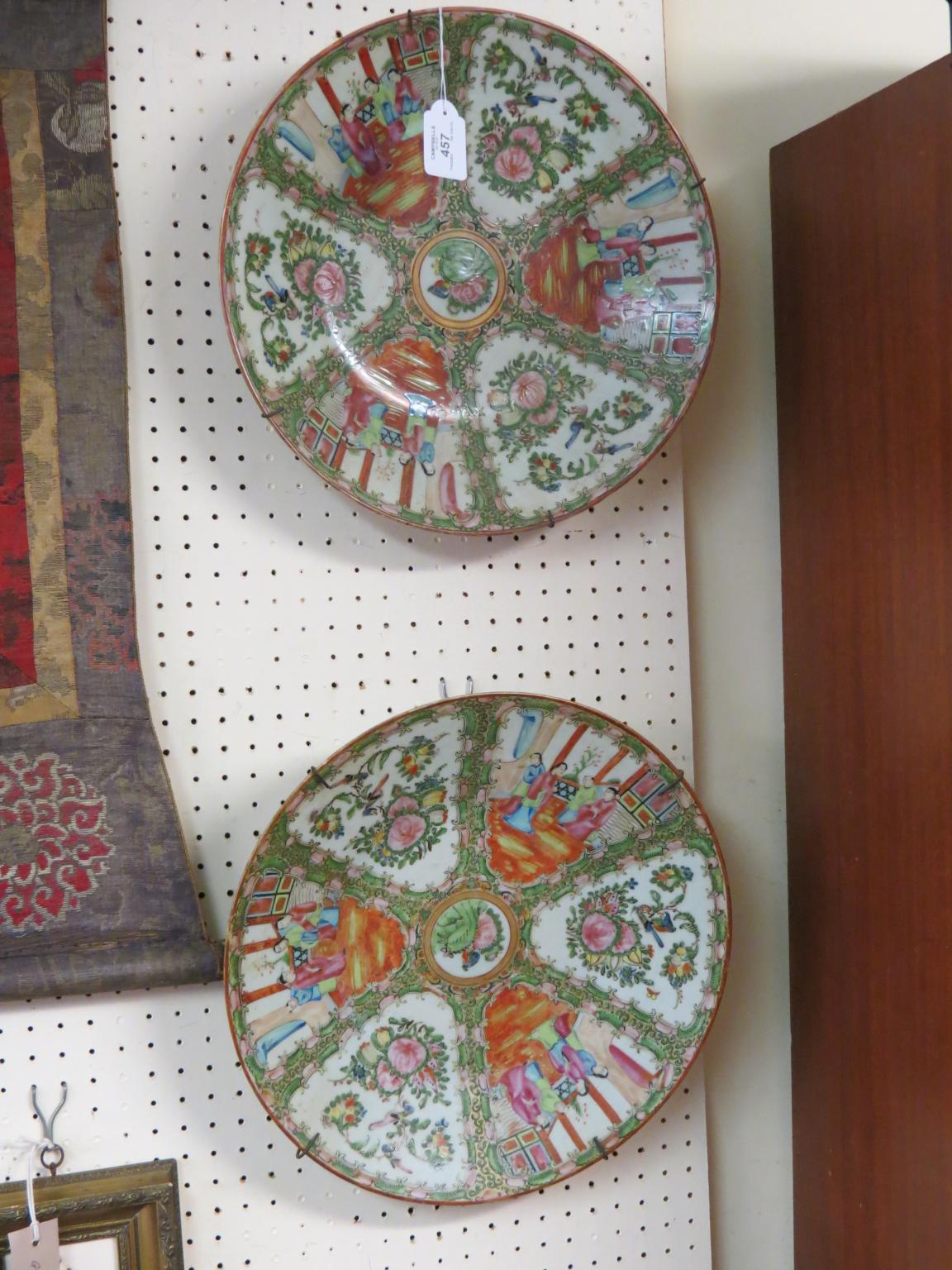 Appraisal: A large pair of Canton wall plates brightly enamelled with