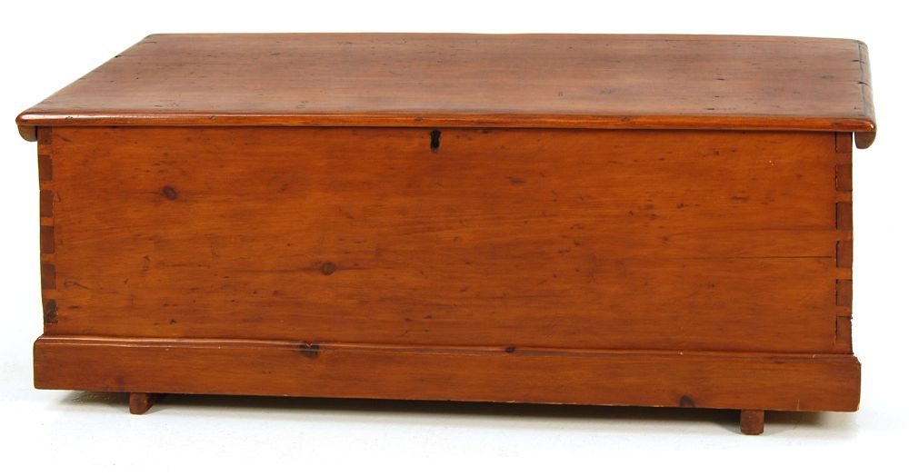 Appraisal: ANTIQUE AMERICAN LIFT-TOP CHEST th CenturyIn pine with dovetail construction