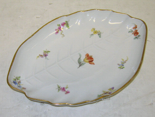 Appraisal: MEISSEN PORCELAIN LEAF SHAPED DISH Painted floral bouquets on white