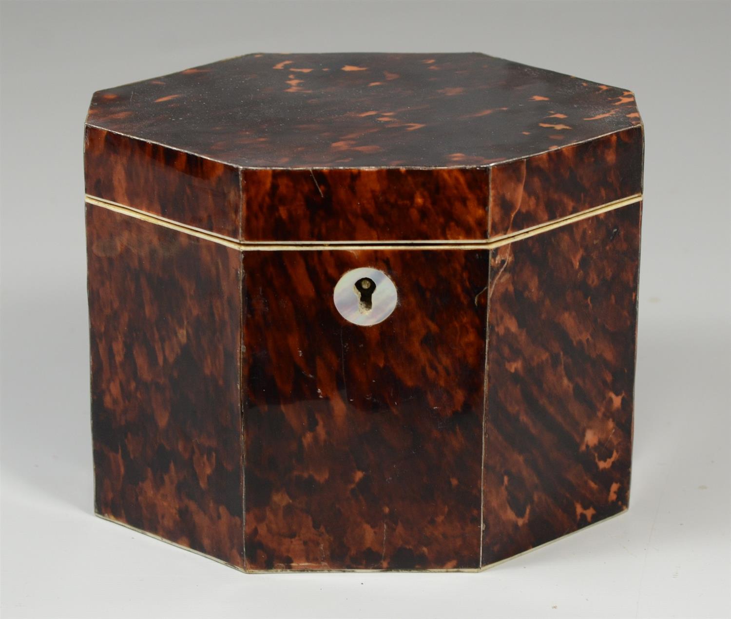 Appraisal: th c tortoise shell veneered tea caddy elongated hexagon lidded