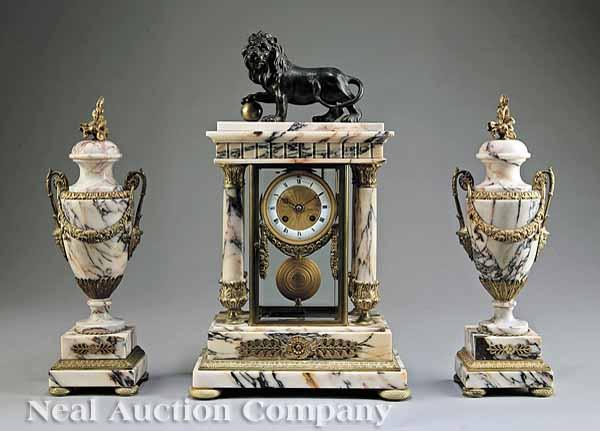 Appraisal: An Antique French Three-Piece Marble and Bronze-Mounted Clock Garniture c