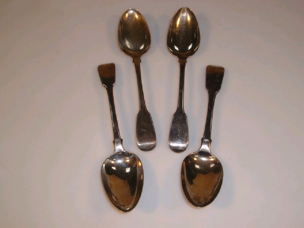 Appraisal: Four Georgian fiddle pattern silver table spoons two by William