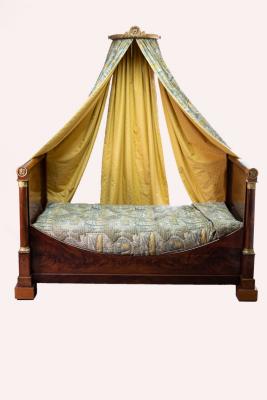 Appraisal: An Empire mahogany lit bateau with gilt metal mounts coronet