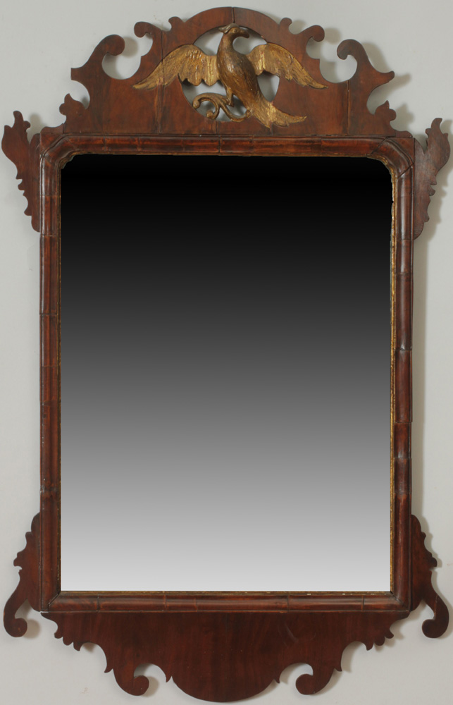 Appraisal: Chippendale Style Mahogany and Parcel-Gilt Mirror With pierced eagle crest