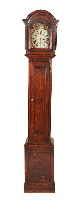 Appraisal: A CONTINENTAL OAK LONG CASE CLOCK hood with arch impedement