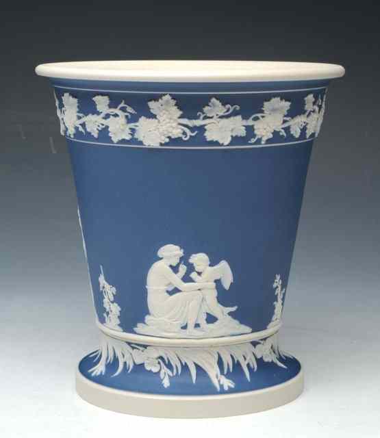 Appraisal: A JASPERWARE JARDINIERE and stand circa of tapering shape on