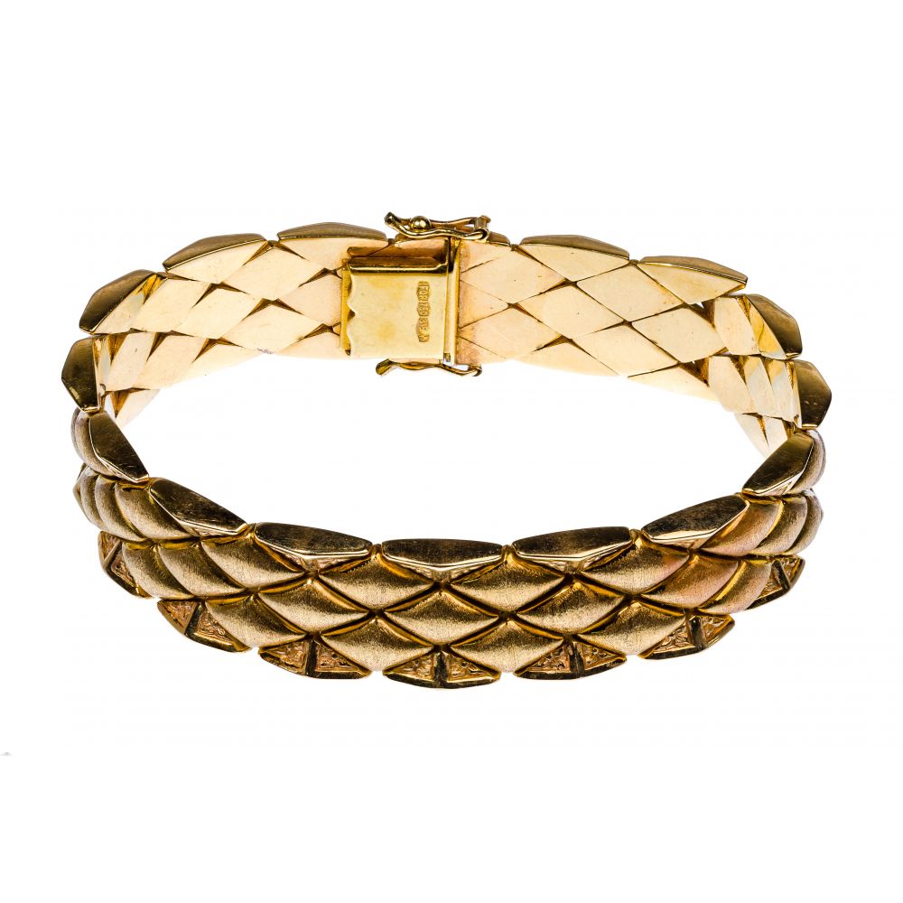 Appraisal: K YELLOW GOLD BRACELETQuilted diamond design having a brushed finish