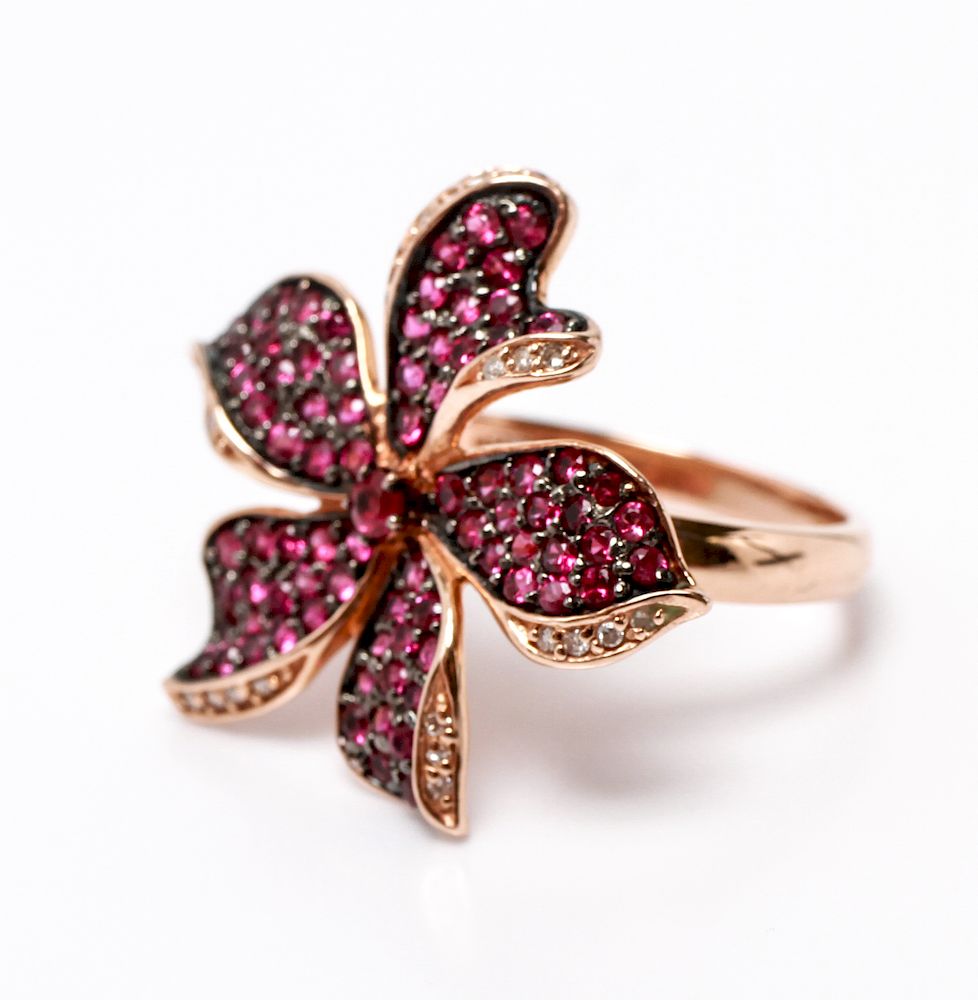 Appraisal: K Rose Gold Rubies Diamonds Flower Motif Ring K rose