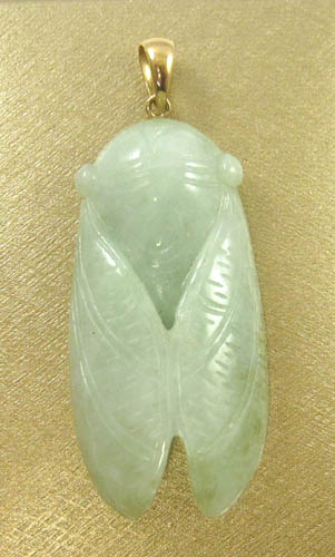 Appraisal: JADEITE AND FOURTEEN KARAT GOLD PENDANT with Mason Kay Certificate