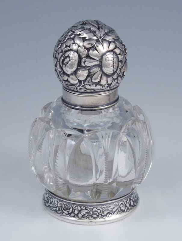 Appraisal: GORHAM STERLING MOUNTED CRYSTAL SCENT BOTTLE A prominent repousse sterling