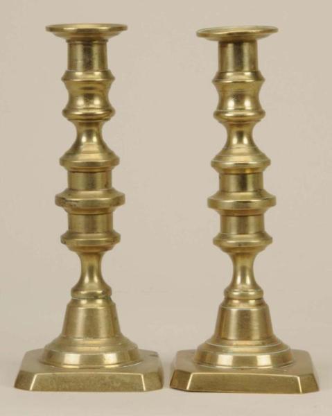 Appraisal: Lot of English Brass Candlesticks Description Circa Core-cast Lacking ejectors