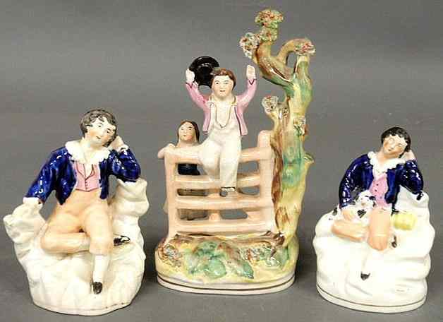 Appraisal: Three th c Staffordshire figural groups tallest h