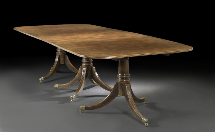 Appraisal: George III-Style Mahogany Dining Table the rounded rectangular top with