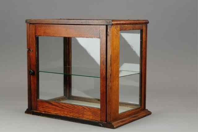 Appraisal: SMALL DISPLAY CASE Rectangular wood frame and glass sided case